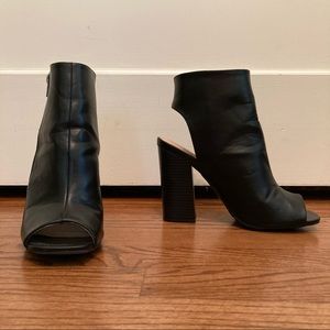 Black leather cut-out heels